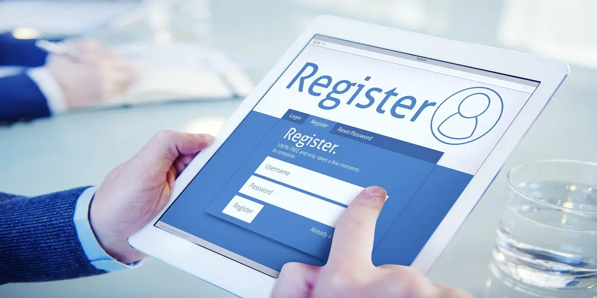 A user filling in details on a tablet as part of the process of registering businesses across different structures online.