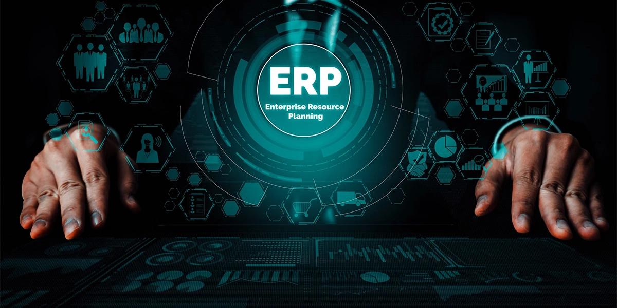 Hands using advanced system for planning in ERP integration to optimise business processes and data management.
